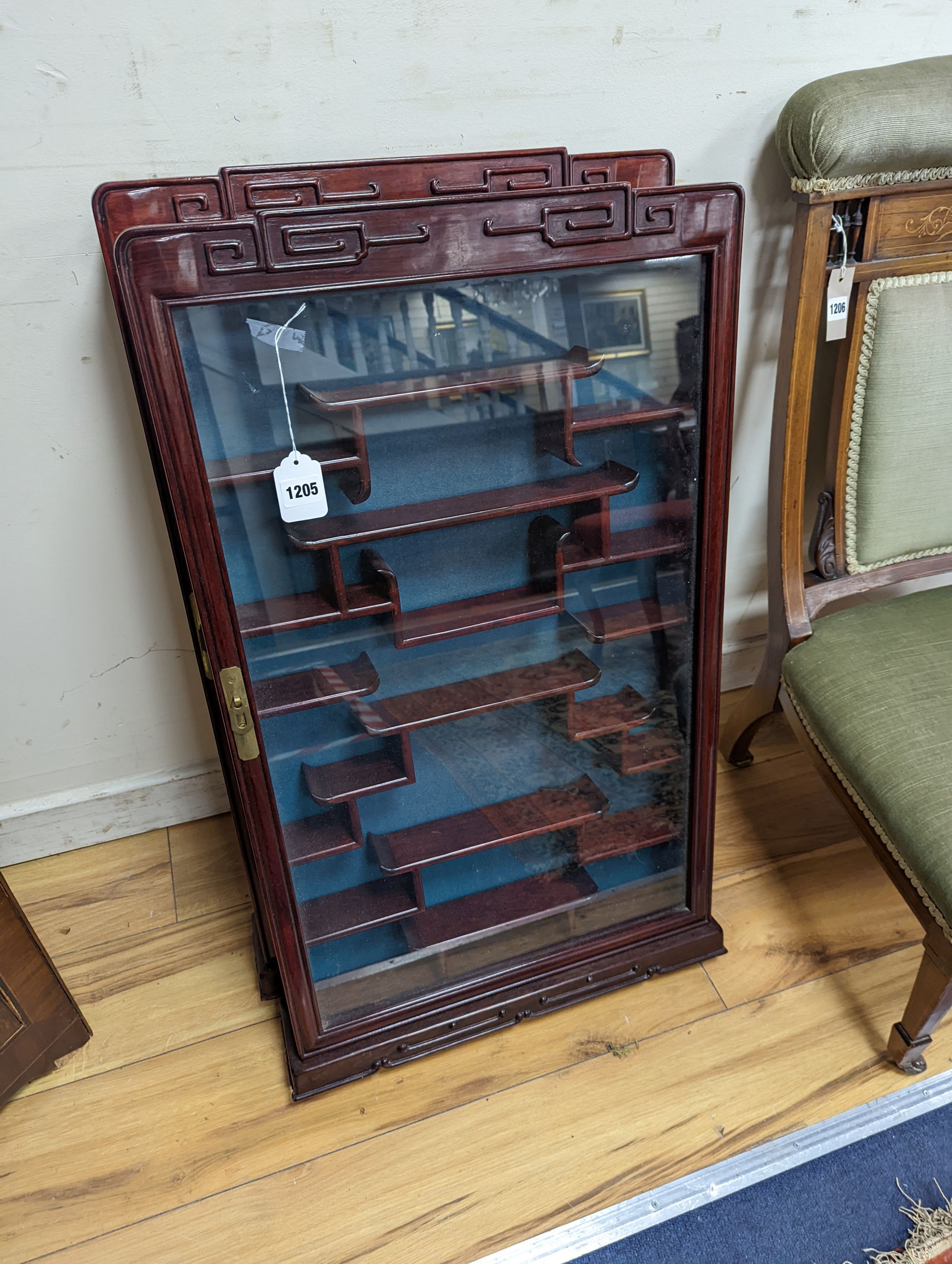 A pair of Chinese hardwood snuff bottle cabinets, width 52cm, height 83cm